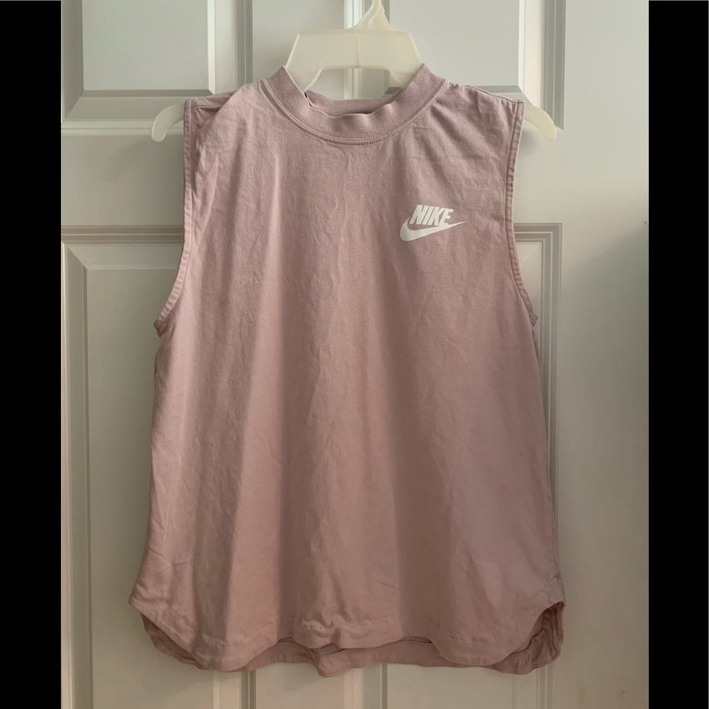 Pale pink Nike shirt